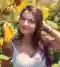 Sessioni fotografiche Estive ritratto di ragazza bruna in un campo di girasoli